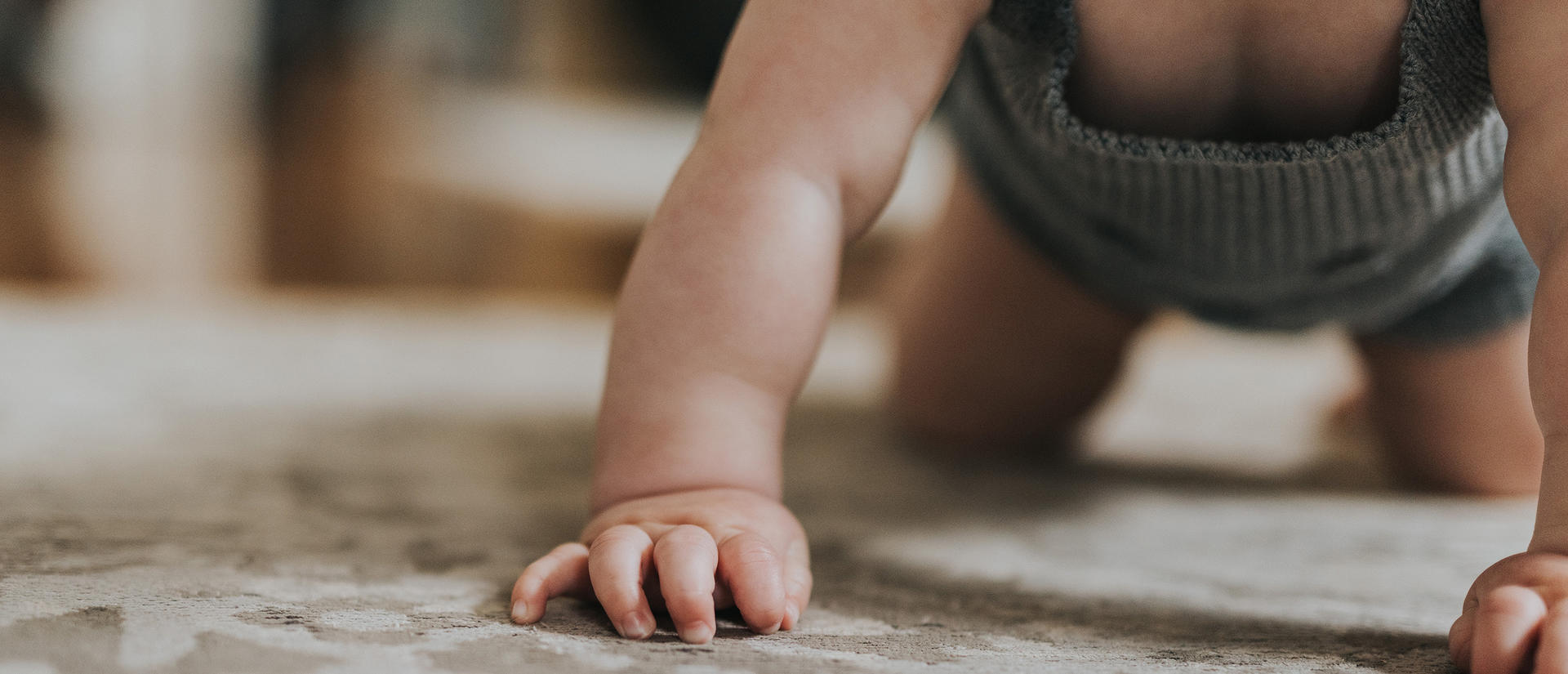 Baby crawling on the ground